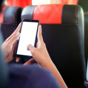 male-passenger-sitting-seat-bus-seat-using-his-phone_279756-20