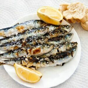 Espeto de sardinas is one of the typical dishes of Malaga that you have to try.